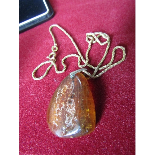 411 - Amber Pendant Ladies Necklace on 9 Carat Gold Chain