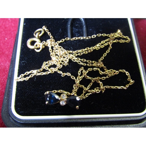 415 - Sapphire and Diamond Ladies Pendant Necklace of Attractive Colour Mounted on 9 Carat Gold Chain