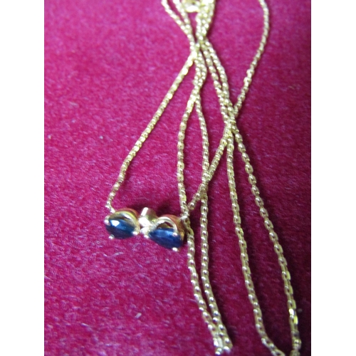 415 - Sapphire and Diamond Ladies Pendant Necklace of Attractive Colour Mounted on 9 Carat Gold Chain