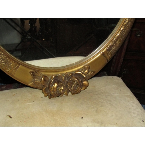 491 - Two Antique Oval Form Gilt Framed Wall Mirrors with Upper Floral Motif Decoration Approximately 26 I... 