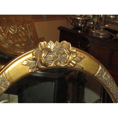 491 - Two Antique Oval Form Gilt Framed Wall Mirrors with Upper Floral Motif Decoration Approximately 26 I... 