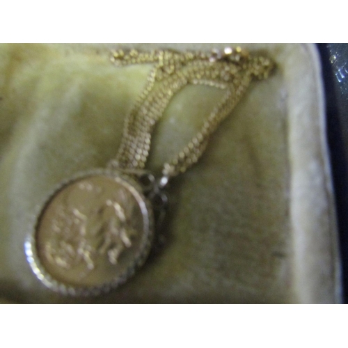 553 - Antique Full Sovereign Gold Dated 1900 contained within 9 Carat Gold Mount Hung from Gold Chain