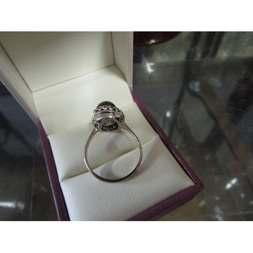 554 - 18 Carat White Gold Mounted Tahitian Black Pearl Mounted Ladies Ring with Cluster Diamond Surround