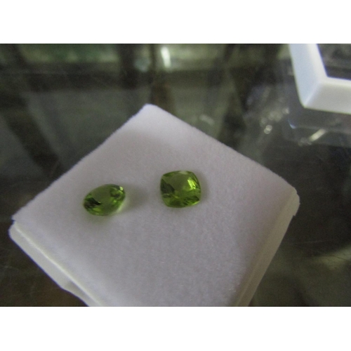 560 - Pair of Cushion Cut Peridot Stones Unmounted Each Approximately 2 Carat Weight