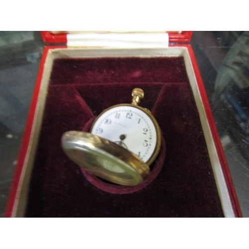 564 - 18 Carat Gold Cased Ladies Pocket Watch with Glazed Hinged Cover Chased Detailing