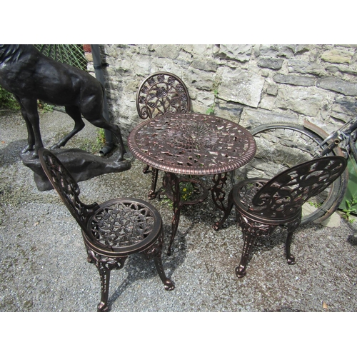 566 - Cast Iron Circular Form Table with Three Matching Chairs