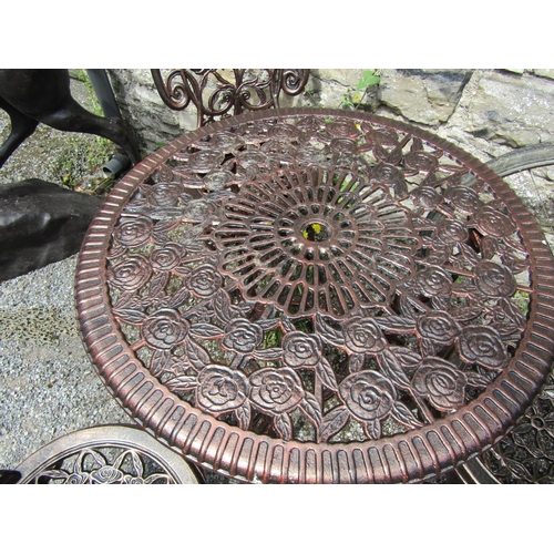 566 - Cast Iron Circular Form Table with Three Matching Chairs