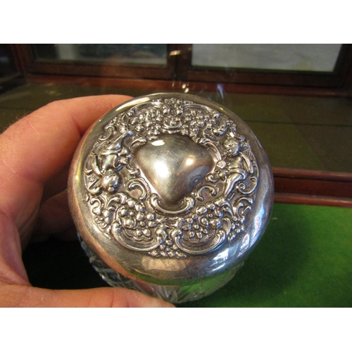 651 - Antique Cut Crystal Table Jar with Solid Silver Cover Embossed Decorated Approximately 4 Inches Wide