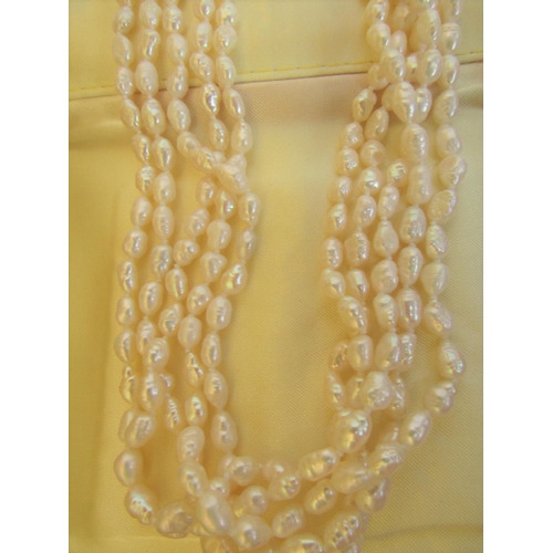 724 - Five Strand Multi Row Necklace of Baroque Freshwater Cultured Pearls with 18 Carat Gold Clasp