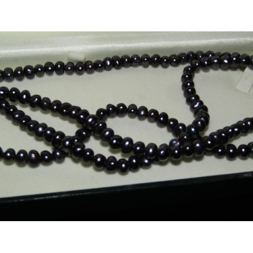 740 - Black Freshwater Necklace of Deep Colour Good Length 4ft Approximately.