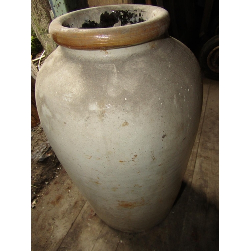 748 - Early Fired Earthenware Jar of Shaped Form Approximately 20 Inches High