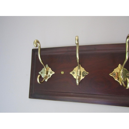 141 - Four Brass Hook Mahogany Panel Mounted Coat and Hat Hanger Approximately 20 Inches Wide