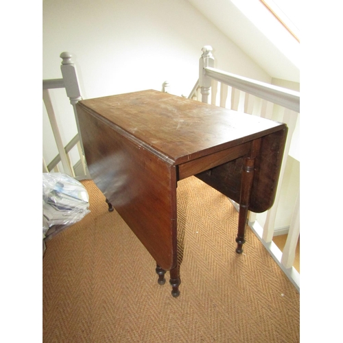 144 - Regency Mahogany Drop Leaf Table Fully Extending to 6ft 6 Inches on Turned Supports