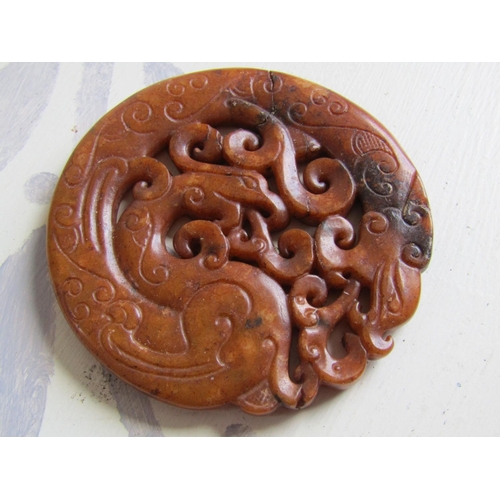 61 - Carved Roundel Depicting Pagan Beast