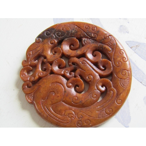 61 - Carved Roundel Depicting Pagan Beast