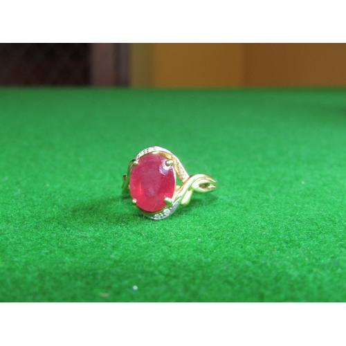 521 - Ruby and Diamond Twist Motif Ladies Ring Mounted on 9 Carat Yellow Gold Ring Size N and a Half