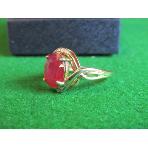 521 - Ruby and Diamond Twist Motif Ladies Ring Mounted on 9 Carat Yellow Gold Ring Size N and a Half