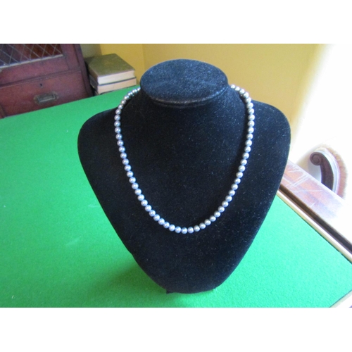 553 - Single Strand Silvered Pearl Ladies Necklace with 10 Carat Gold Clasp Length Approximately 42cm