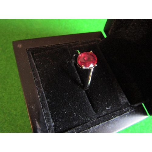 555 - Ruby Oval Cut Centrestone Ring Mounted in Four Claw Setting Set on Silver Band