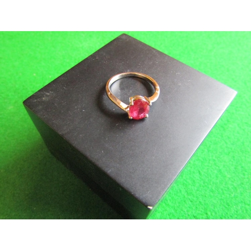 555 - Ruby Oval Cut Centrestone Ring Mounted in Four Claw Setting Set on Silver Band