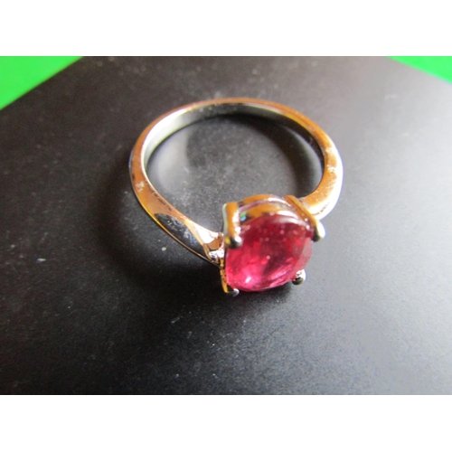 555 - Ruby Oval Cut Centrestone Ring Mounted in Four Claw Setting Set on Silver Band