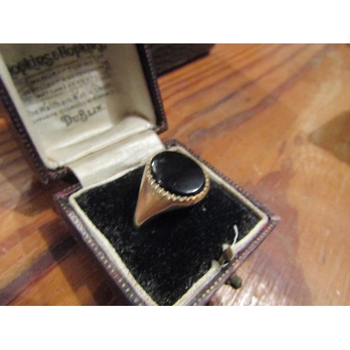 557 - Gentlemans Onyx Signet Ring Mounted on 9 Carat Yellow Gold Ring Approximate Ring Size T