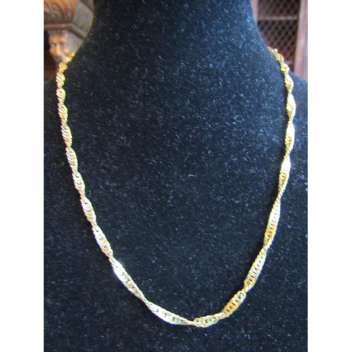 59 - 9 Carat Gold Ladies Chain Necklace of Twisting Form