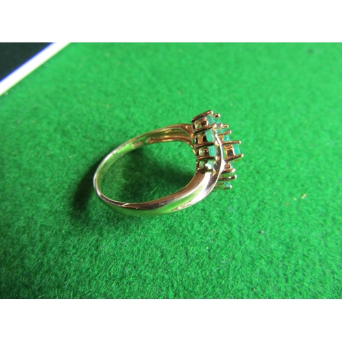 71 - 14 Carat Gold Mounted Emerald Set Ladies Cluster Ring