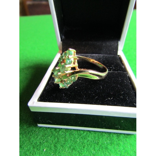 71 - 14 Carat Gold Mounted Emerald Set Ladies Cluster Ring