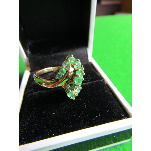 71 - 14 Carat Gold Mounted Emerald Set Ladies Cluster Ring