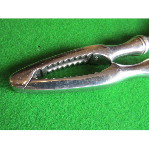 99 - Pair of Solid Silver Handled Nut Crackers of Turned Form