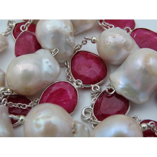 100 - Ruby and Cultured Pearl Ladies Necklace of Attractive Form Length Approximately 96cm