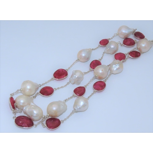 100 - Ruby and Cultured Pearl Ladies Necklace of Attractive Form Length Approximately 96cm