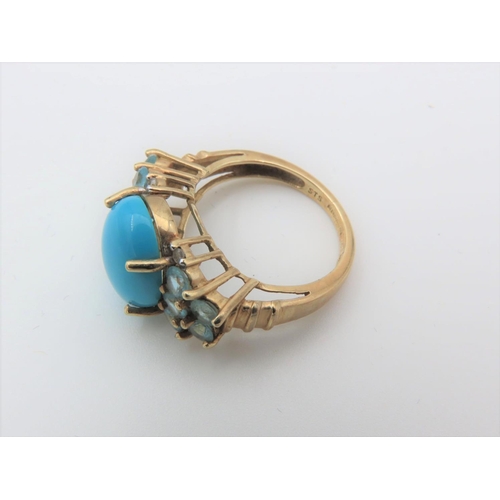 101 - Turquoise Set Cabochon Cut Centre Stone Ring with Side Topaz Decoration Mounted on 9 Carat Yellow Go... 