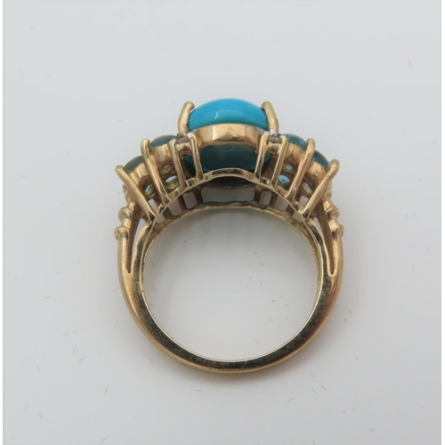 101 - Turquoise Set Cabochon Cut Centre Stone Ring with Side Topaz Decoration Mounted on 9 Carat Yellow Go... 