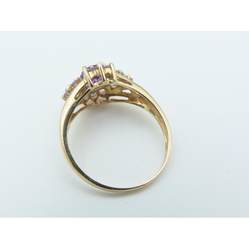 112 - Amethyst and Tanzanite Set Ladies Ring Hallmarks 2005 Mounted on 9 Carat Yellow Gold Band Ring Size ... 