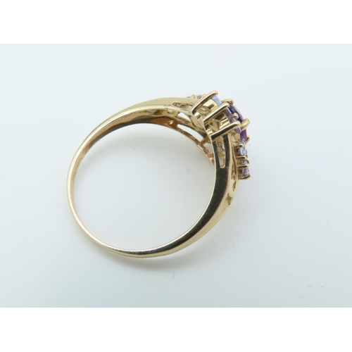 112 - Amethyst and Tanzanite Set Ladies Ring Hallmarks 2005 Mounted on 9 Carat Yellow Gold Band Ring Size ... 