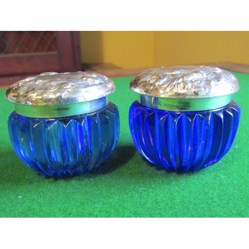 1166 - Pair of Bristol Blue Circular Form Crystal Table Top Jars with Solid Silver Embossed Decorated Cover... 