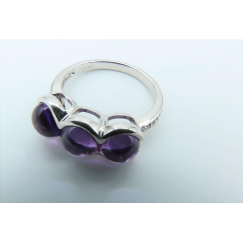 125 - 9 Carat White Gold Set Amethyst Ladies Three Stone Ring with Further Diamond Decorated Shoulders