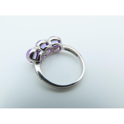 125 - 9 Carat White Gold Set Amethyst Ladies Three Stone Ring with Further Diamond Decorated Shoulders