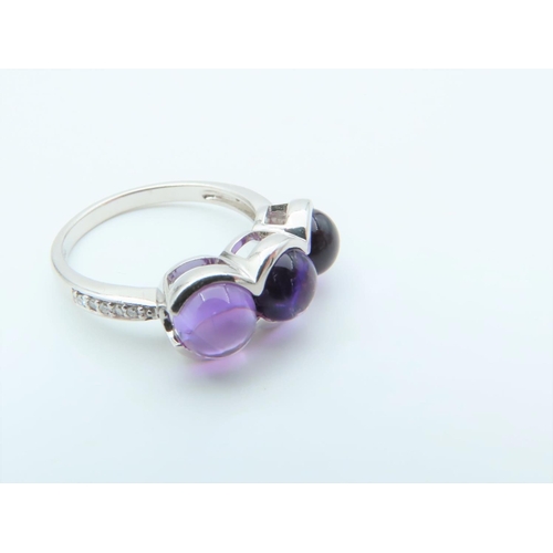 125 - 9 Carat White Gold Set Amethyst Ladies Three Stone Ring with Further Diamond Decorated Shoulders