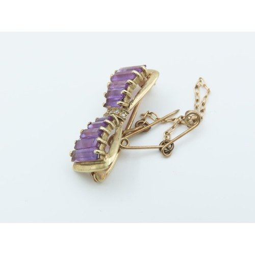 133 - Amethyst and Diamond Set Assent Bow Motif Brooch 9 Carat Gold Approximately 2.6cm Wide