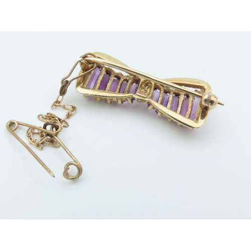 133 - Amethyst and Diamond Set Assent Bow Motif Brooch 9 Carat Gold Approximately 2.6cm Wide