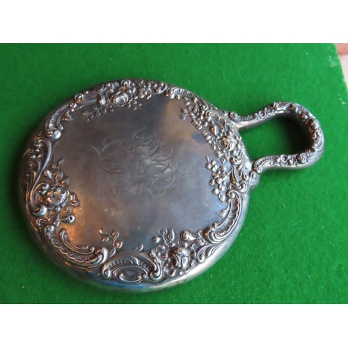 181 - Solid Silver Embossed Decorated Hand Mirror Circular Form