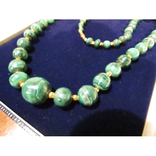 222 - Unusual Malachite Bead Necklace of Graduated Form with Gilt Metal Spacers Approximately 64cm Long