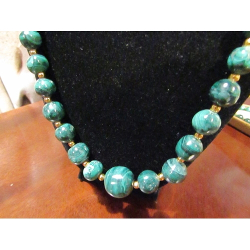 222 - Unusual Malachite Bead Necklace of Graduated Form with Gilt Metal Spacers Approximately 64cm Long