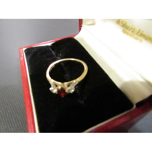 223 - 18 Carat Gold Ruby and Diamond Ladies Three Stone Ring Size P and a Half