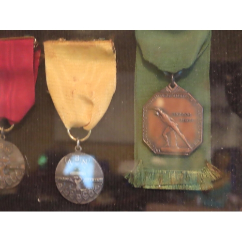 252 - Cased Medals Under Glass Quantity As Photographed