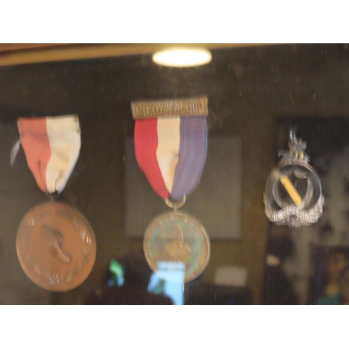 252 - Cased Medals Under Glass Quantity As Photographed