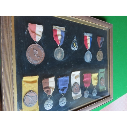 252 - Cased Medals Under Glass Quantity As Photographed